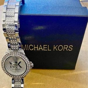 BRAND NEW!! Michael kors womans watch. Perfect gift for the holidays.